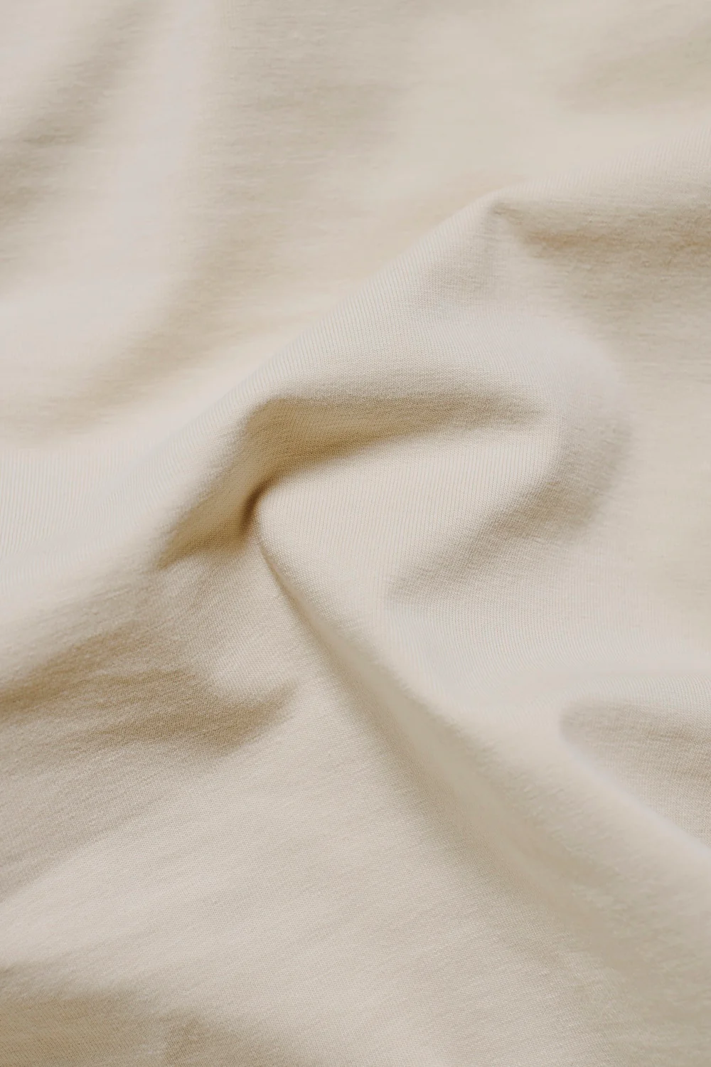 Essential Jersey Buttonless Polo Shirt in Alabaster - Image 8