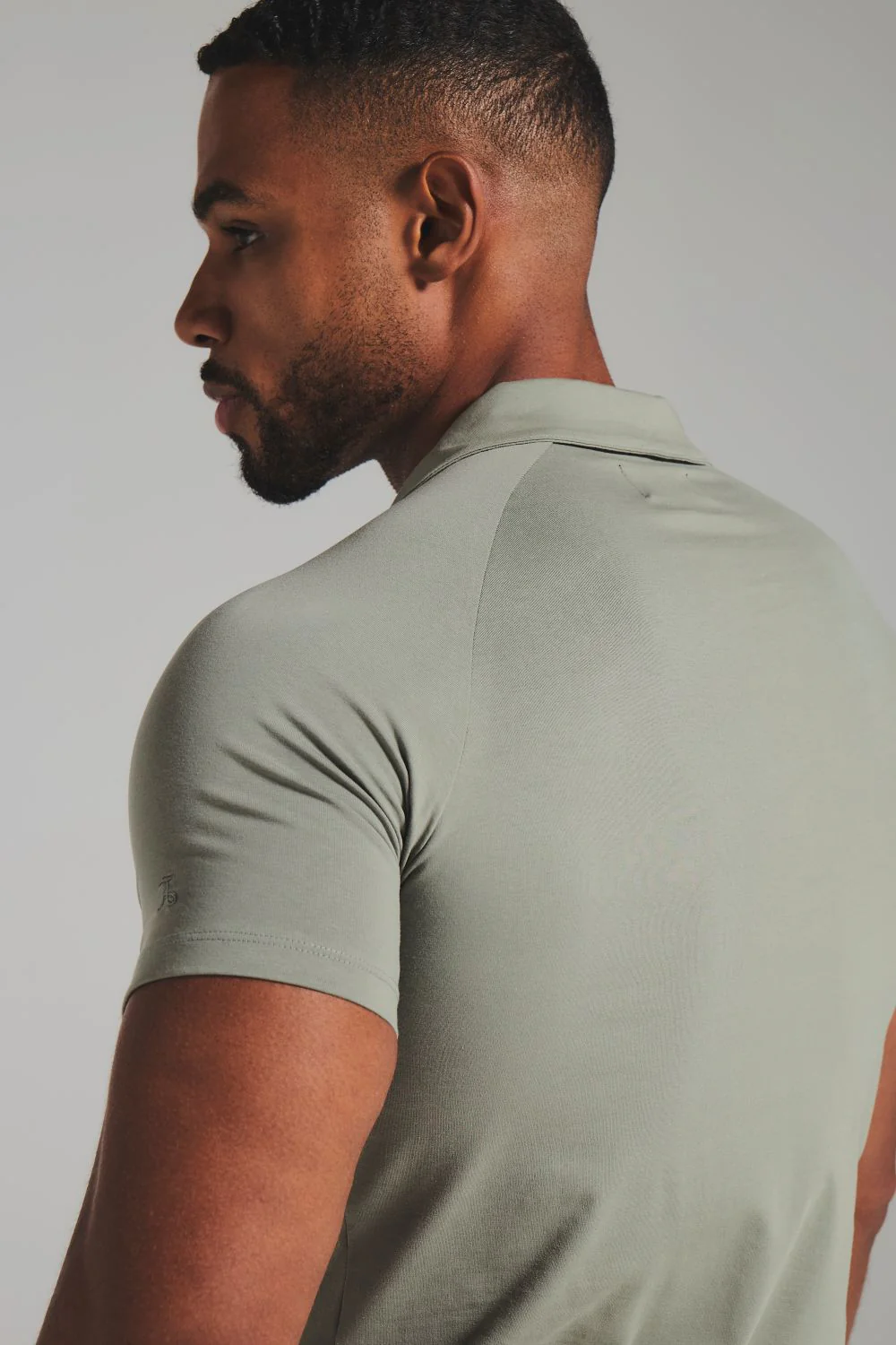 Essential Jersey Buttonless Polo Shirt in Soft Khaki - Image 6