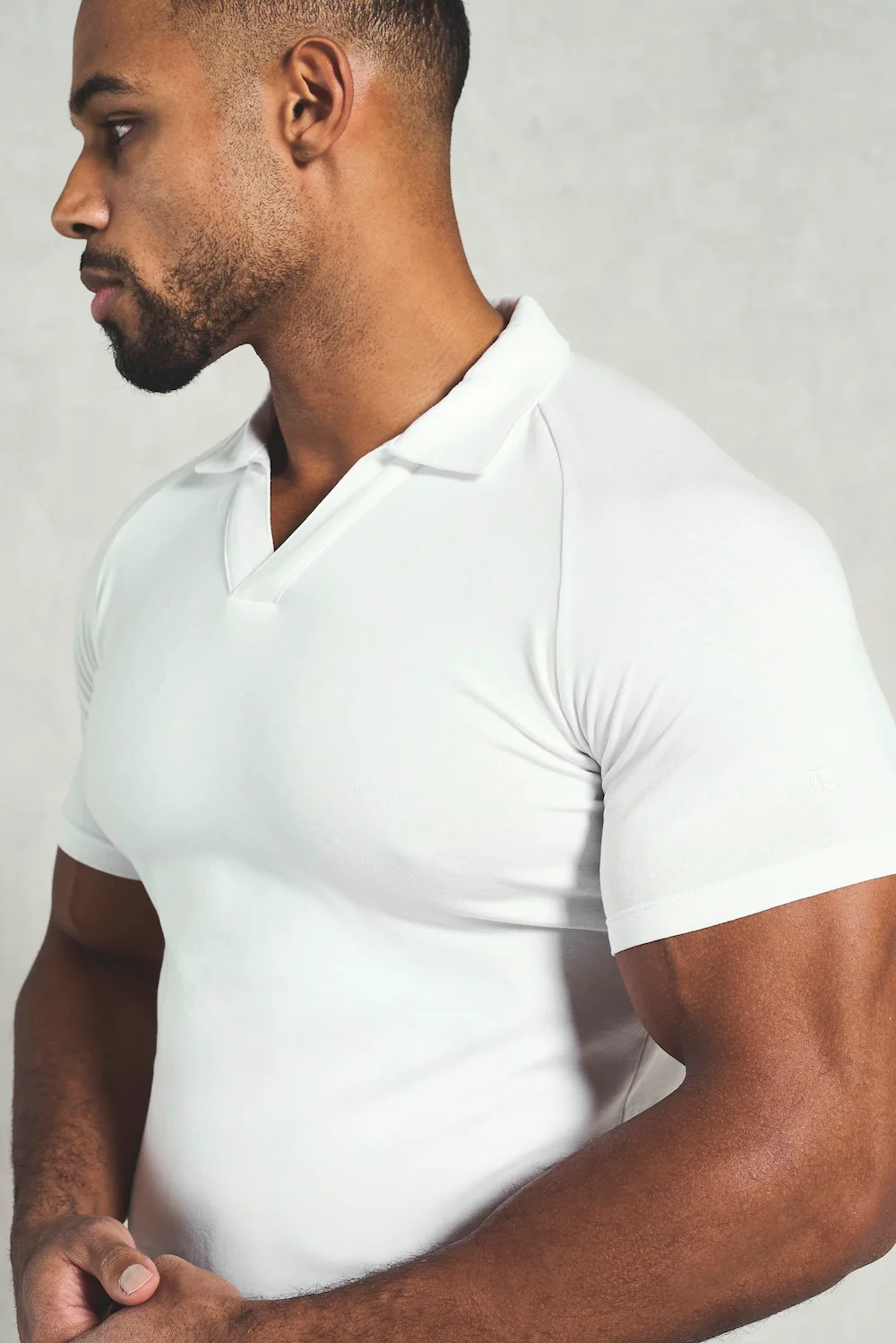 Essential Jersey Buttonless Polo Shirt in White - Image 4