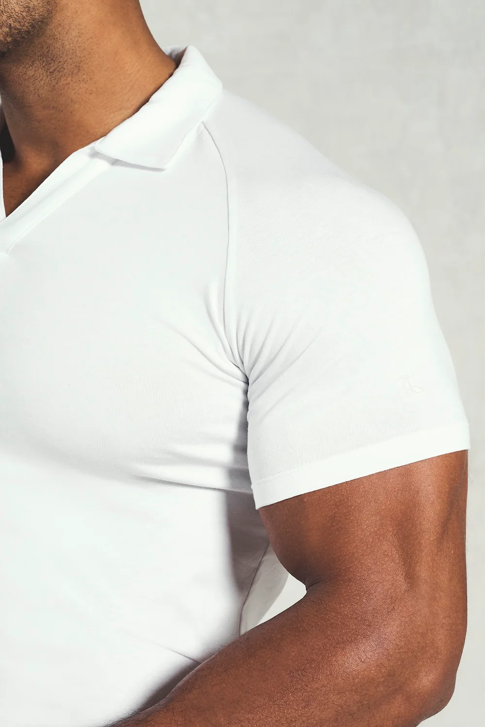 Essential Jersey Buttonless Polo Shirt in White - Image 5