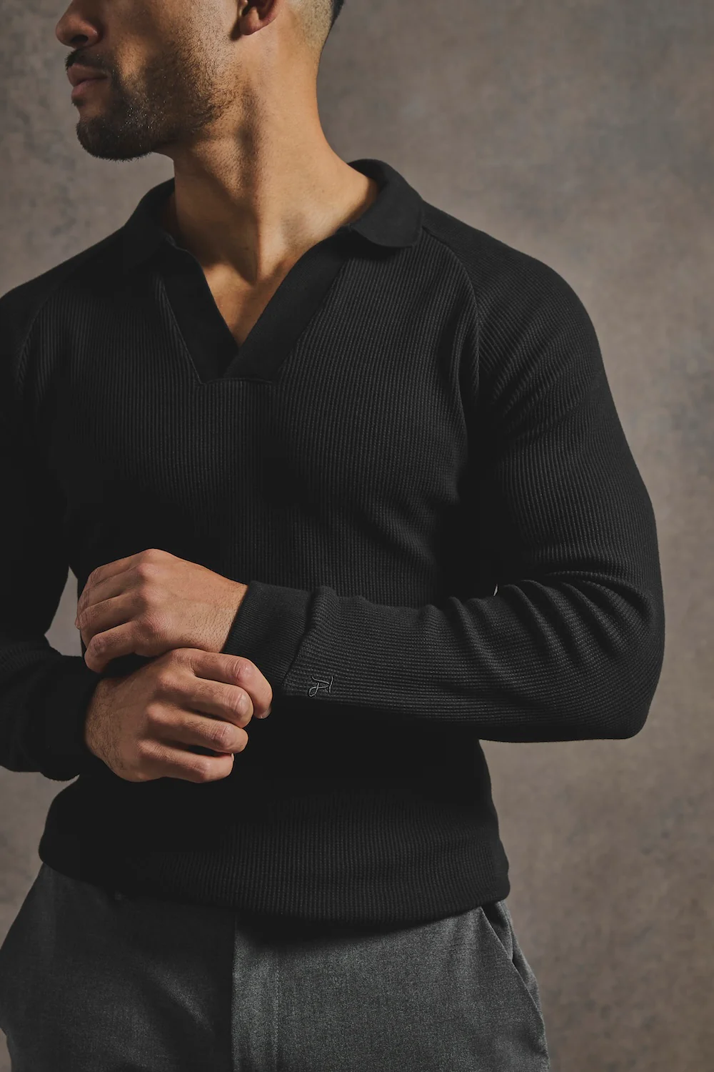 Textured Buttonless Polo Shirt in Black - Image 4